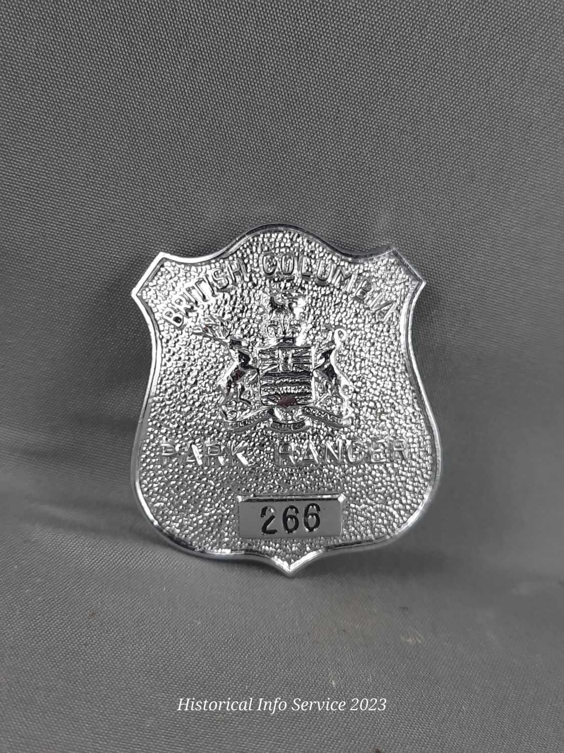 very curved, silver, single screw lug, 1 9/16" tall